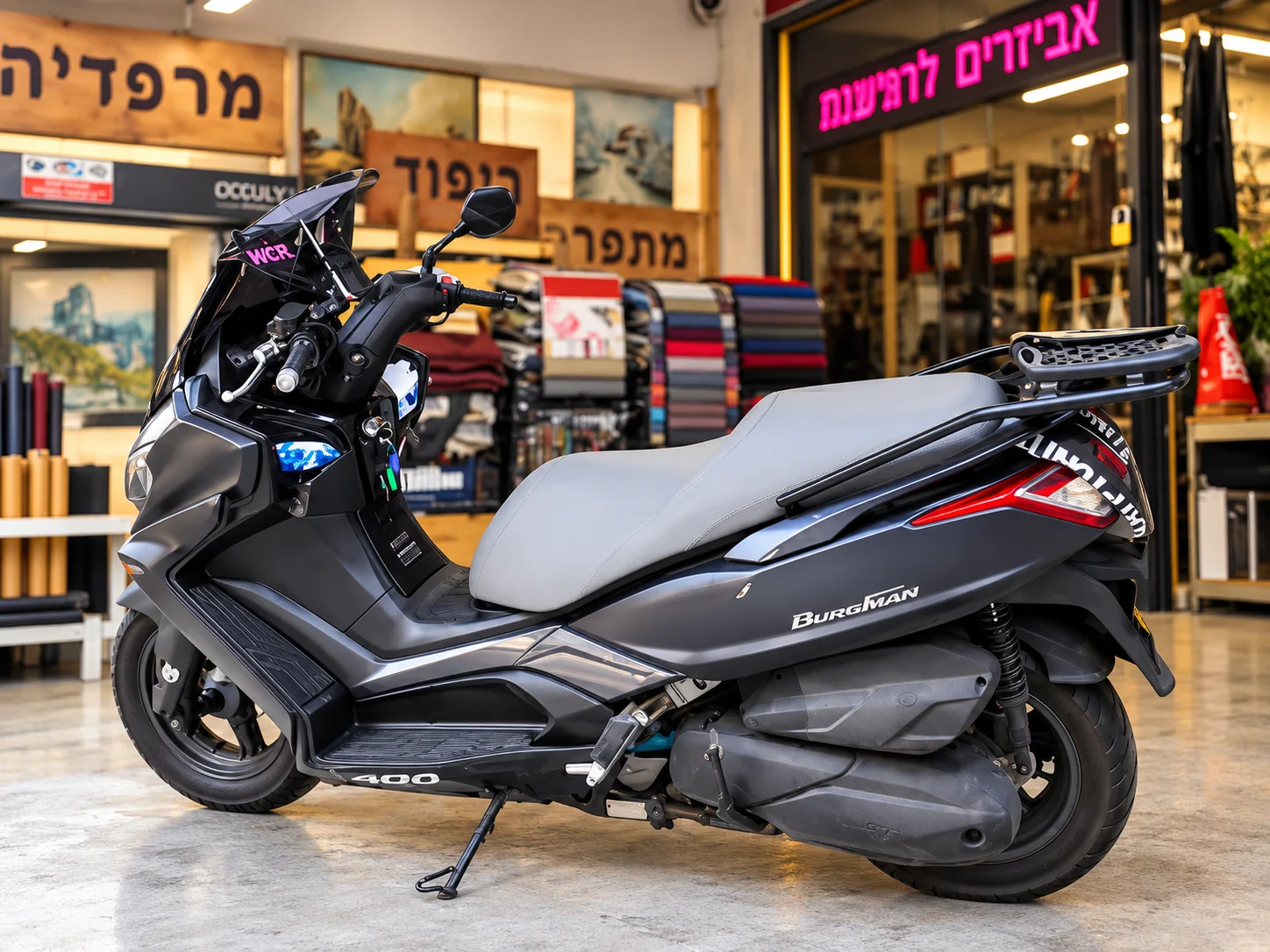 מושב קטנוע לאחר תפירה וחידוש ריפוד